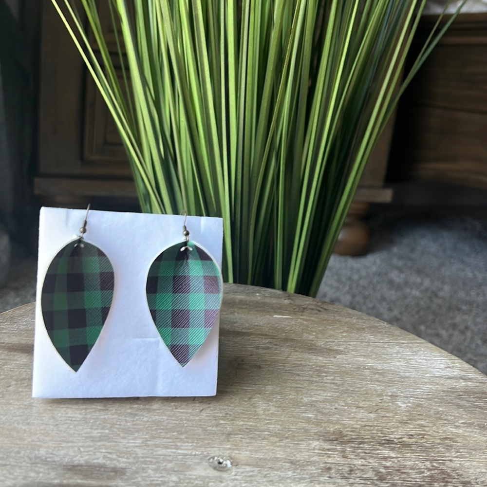 Faux leather earrings. Purchased from local vendor. Never been worn.